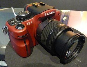 Вот такой вот фотик: Panasonic DMC-G1, красненький