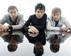 Сходить на концерт группы Muse