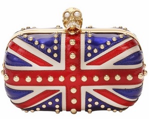 PATENT STUDDED BRITTANIA SKULL CLUTCH by Alexander McQueen