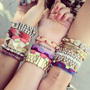 buy and wear a lot of bracelets