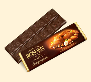 Шоколад Roshen с карамелизованным миндалем и цельными лесными орехами (экстрачерный)