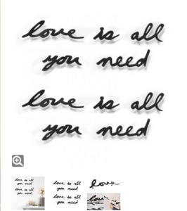 Надпись "Love is all you need"