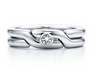 matching platinum wedding bands.  tiffany love match puzzle ring