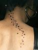 Stars tattoo on the neck