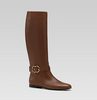 'ride' flat boot with double G ornament by Gucci