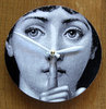 Sh-h-h-h. Small Fornasetti image wall clock