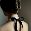 Pearls + black ribbon