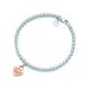 Return to Tiffany™ bead bracelet in silver and RUBEDO metal, medium. | Tiffany & Co.