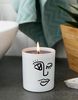 Свеча с принтом лица и ароматом граната и белого инжира Flamingo Candle