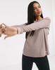 Nike Training Pro long sleeve top with cross back in smokey mauve